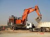 mtambo excavator and benz.jpg