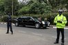 2AD5D65600000578-3174807-Convoy_Police_officers_stand_guard_as_Obama_s_convoy_drives_to_t-a-100_.jpg