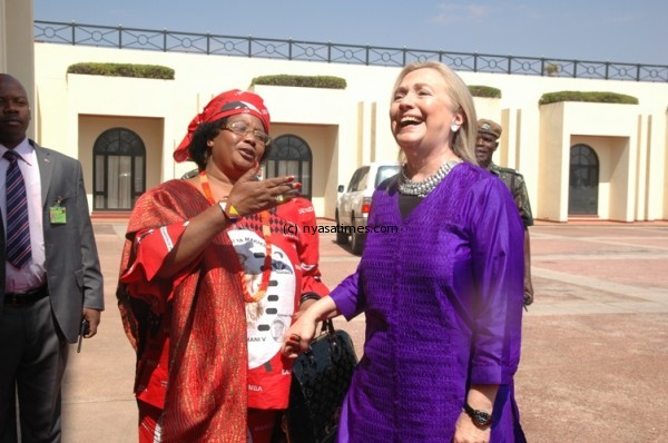 feel-free-you-are-welcome-to-malawi-president-Joyce-Banda-and-Hillary-Clinton-at-state-house-600x398.jpg
