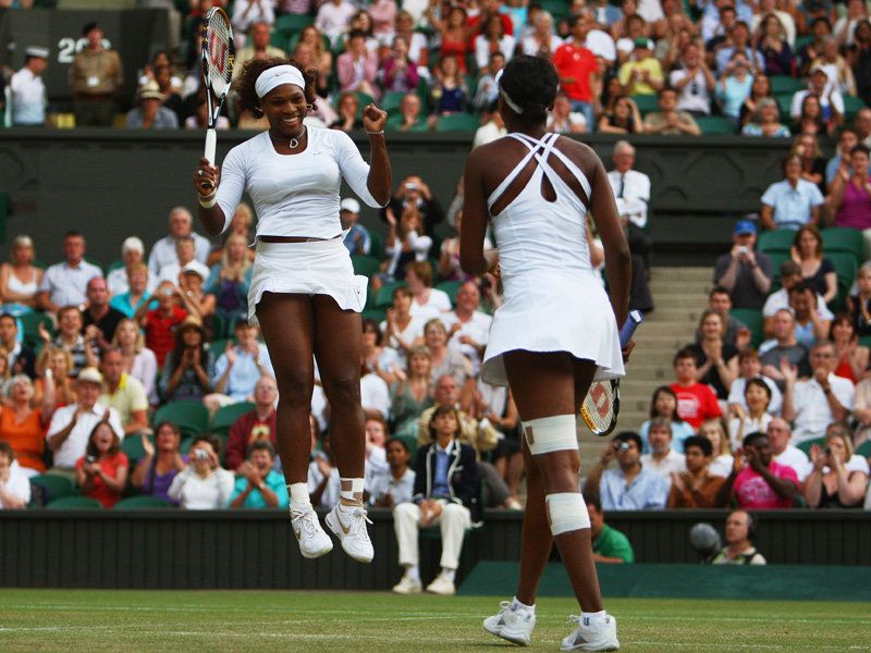 Serena-Venus-celebrating-doubles-win_2325470.jpg