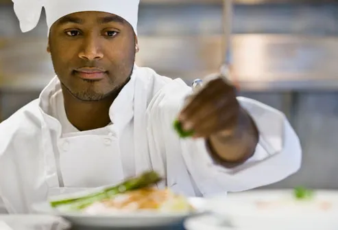 getty_rf_photo_of_chef_seasoning_dish.jpg