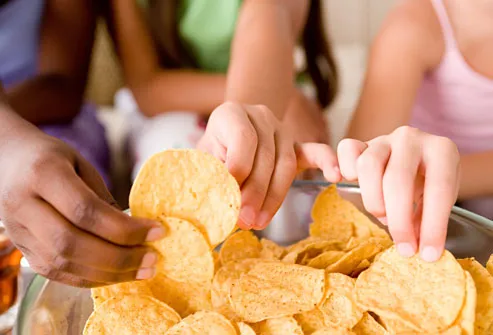 getty_rf_photo_of_kids_eating_chips.jpg