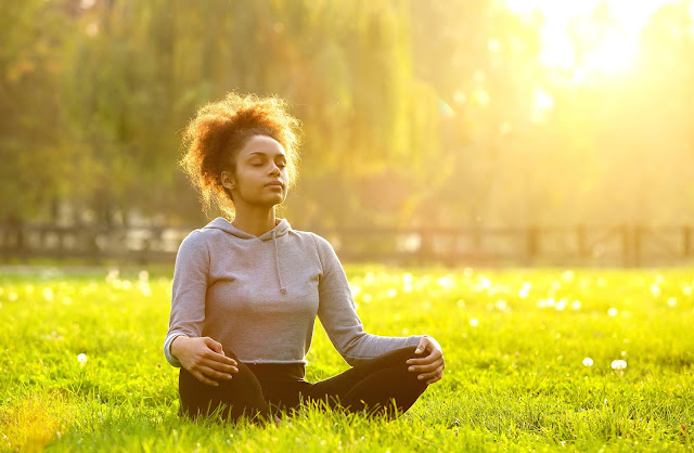 bigstock-African-American-Woman-Meditat-92821154.jpg