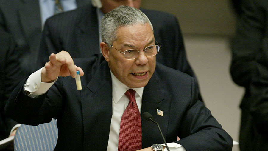 colin-powell-holds-up-a-vial.jpg