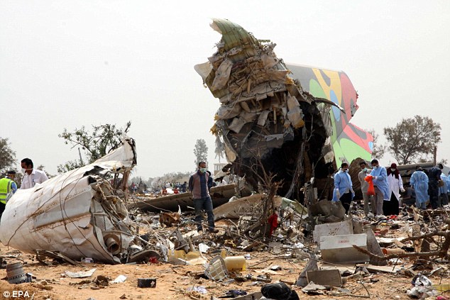 Explosion: The debris of the Afiqiyah Airways plane crash, which a ten-year-old boy miraculously survived