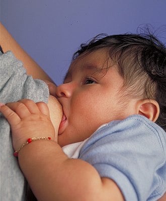 330px-Breastfeeding_infant.jpg
