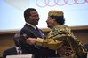 Jakaya_Kikwete_and_Muammar_al-Gaddafi_12th_AU_Summit_090202-N-0506A-678.jpg