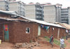 05_standard_kiberas_new_housing_irony_mud_structures_090830_small1.jpg