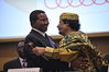 220px-Jakaya_Kikwete_and_Muammar_al-Gaddafi,_12th_AU_Summit,_090202-N-0506A-678.jpg