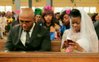 bride ignores her husband for blackberry phone on wedding day.jpg