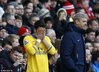 1393692919880_lc_galleryImage_Arsenal_s_Mesut_Ozil_L_pr.JPG