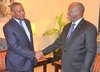 Magufuli with Dangote.jpg