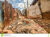 kibera-slum-nairobi-kenya-march-houses-dirt-roads-covered-garbage-71376260.jpg