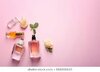 perfume-bottles-on-pink-background-260nw-666006625.jpeg