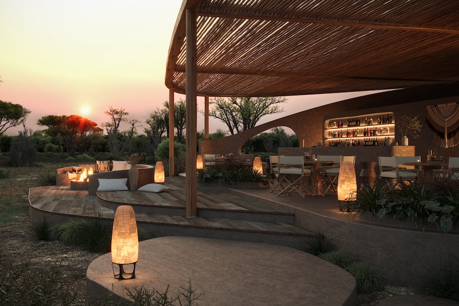 Ubuyu, a Banyan Tree Escape Tanzania Ruaha National Park thatched roof open air bar lantern lights fire pit