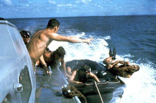 US_Navy_SEALs_SEAL_jumps_over_side_boat.jpg