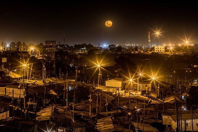 Everyday Africa on Twitter: The moon rises above the sky in Kibera.  Security lights installed in different parts come on at dusk and help to  illuminate the wider sections of the slum.