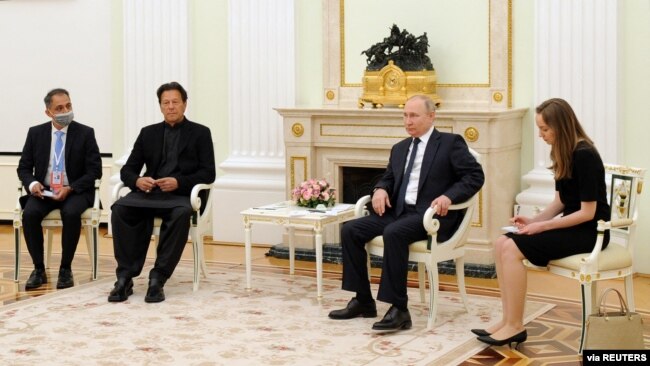 FILE - Russian President Vladimir Putin meets with Pakistan's Prime Minister Imran Khan in Moscow, Russia, Feb. 24, 2022. (Sputnik/Mikhail Klimentyev/Kremlin via Reuters)
