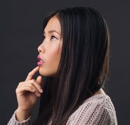 Photo of a woman thinking, to illustrate the human brain's ability to process a million messages a second, an amazing ability that answers the question, 'Is There a God?''s ability to process a million messages a second, an amazing ability that answers the question, 'Is There a God?'