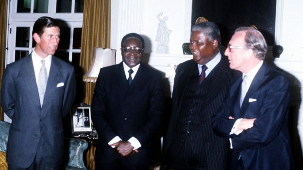 The Prince of Wales (left) with Robert Mugabe (second left), Prime Minister of the newly independent Zimbabwe (formerly Rhodesia), Joshua Nkomo and Foreign Secretary Lord Carrington during a dinner at Government House in Salisbury (now Harare)