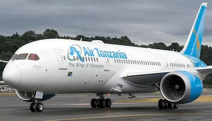 Air Tanzania aircraft fleet, Air Tanzania Boeing 737 9 MAX, Air Tanzania plane on runway, Tanzania airline expansion, East Africa aviation growth, Serengeti tourism flights, Mount Kilimanjaro travel routes, Zanzibar airport travel, Dar es Salaam international airport aircraft, Kilimanjaro International Airport runway, African airline fleet modernisation, East Africa tourism aviation, Air Tanzania cargo aircraft, Tanzania national carrier aircraft, Getaway Magazine