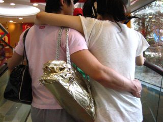 men-holding-handbags.jpg