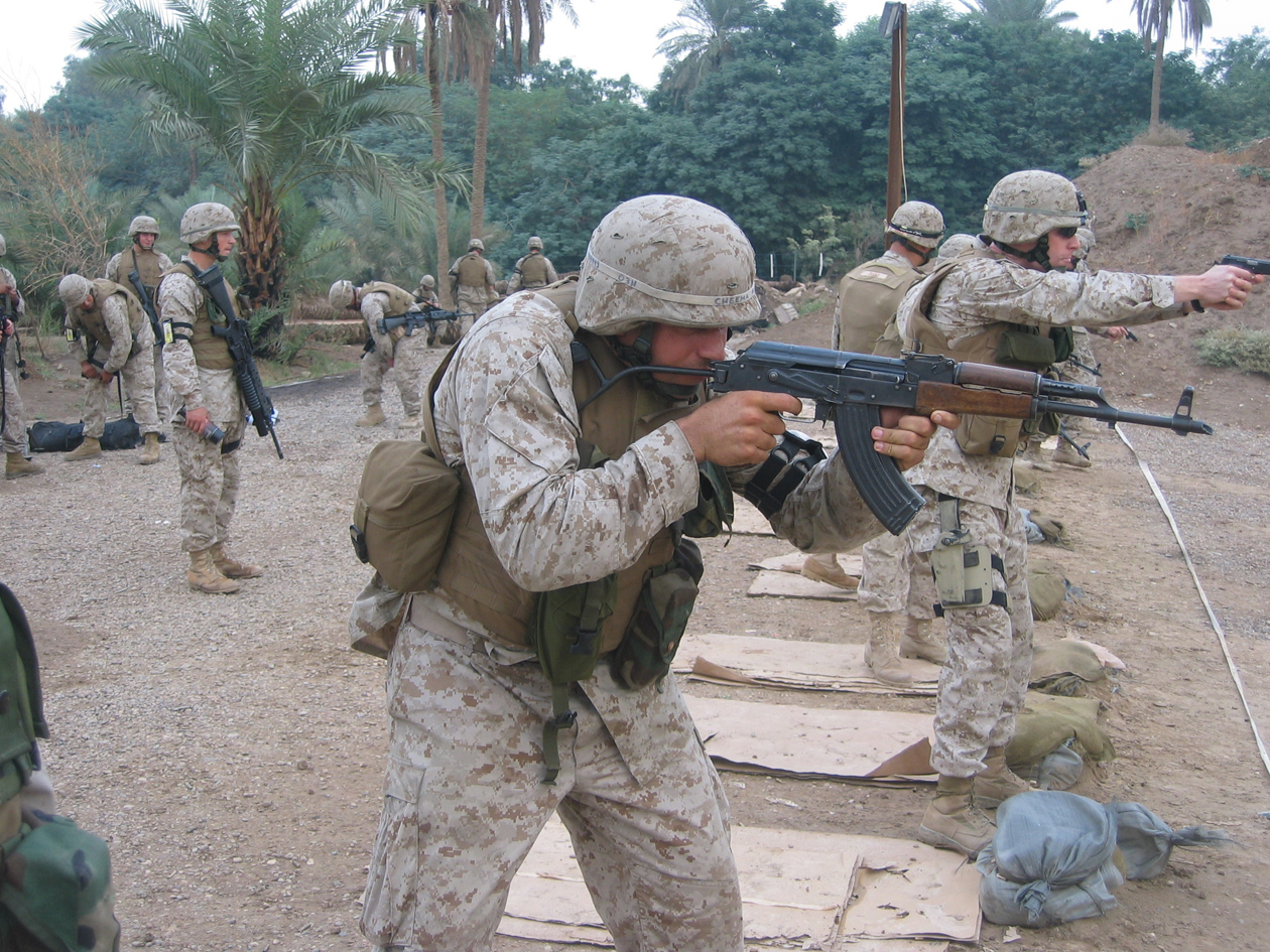 LCpl_Cheema_on_the_AK-47.JPG