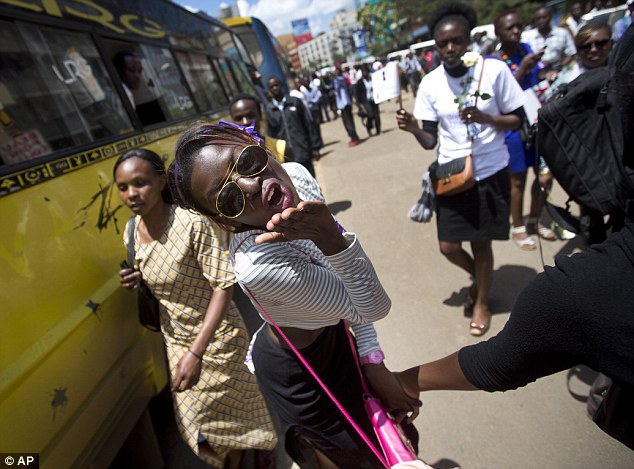 1416241159242_Image_galleryImage_A_Kenyan_woman_protesting.JPG