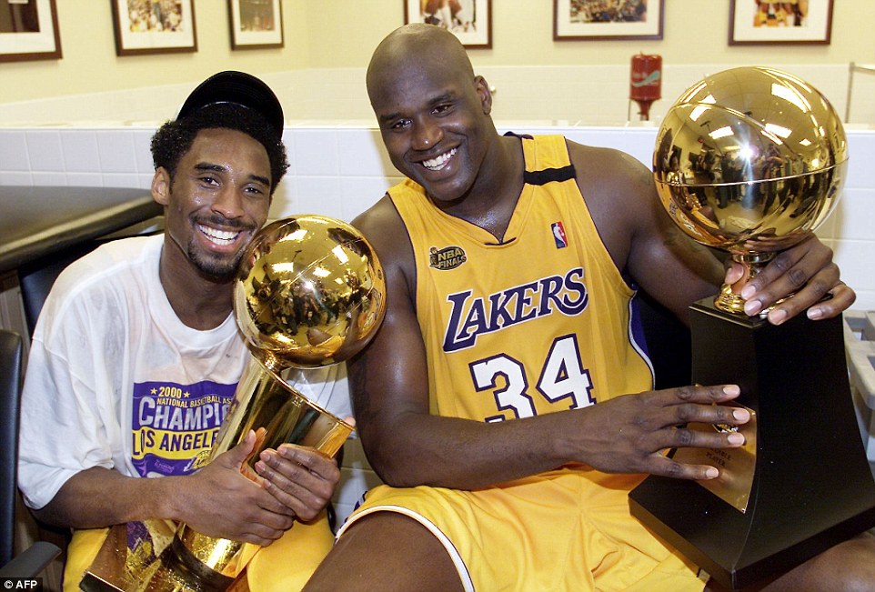 002B3FD100000258-0-Bryant_left_celebrates_his_first_NBA_title_with_Lakers_team_mate-a-15_1460557702716.jpg