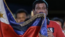 161007161248-duterte-kiss-flag-small-169.jpg