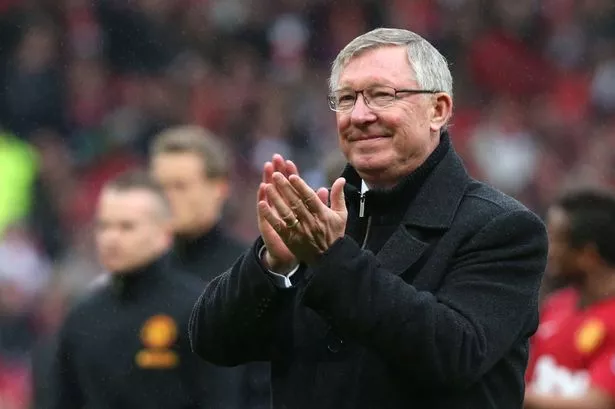 Manager-Sir-Alex-Ferguson-applauds-the-crowd-after-his-last-game-as-manager-of-Manchester-United-at-Old-Trafford.jpg