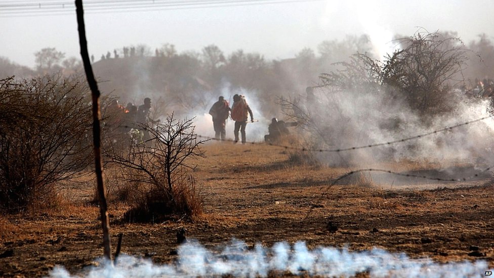 _62330962_teargasminers1608_ap.jpg