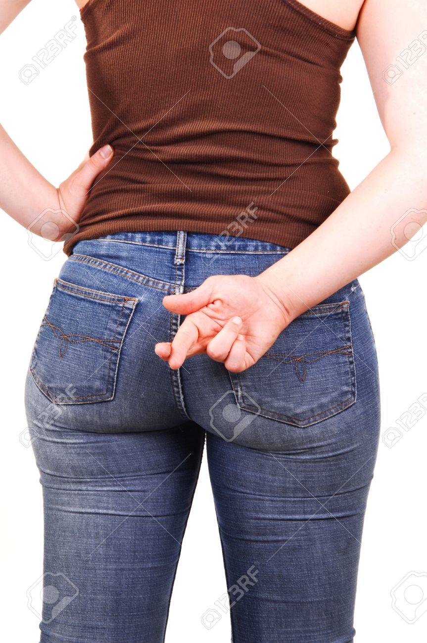 4924336-The-back-of-a-young-girl-in-a-brown-top-and-blue-jeans-with-the-nice-round-butt-and-the-right-hand-w-Stock-Photo.jpg