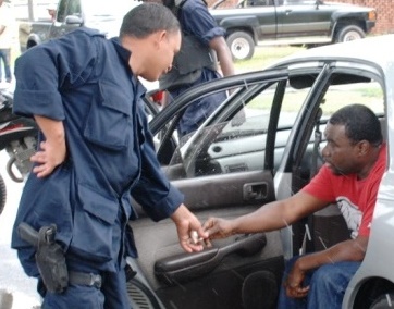 guyana-police-officeer-accepting-a-bribe-1.jpg