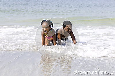 african-american-children-playing-beach-1537530.jpg