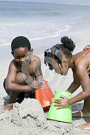 african-american-children-playing-beach-1537585.jpg