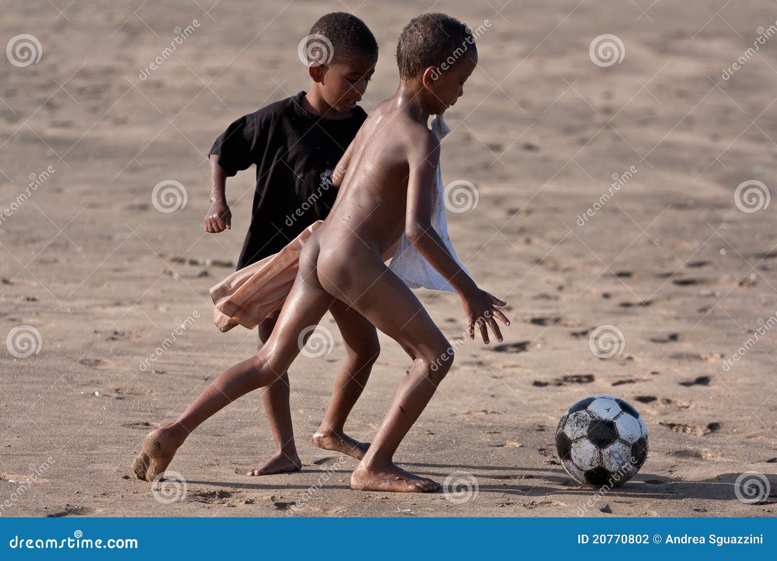 african-children-playing-football-20770802.jpg