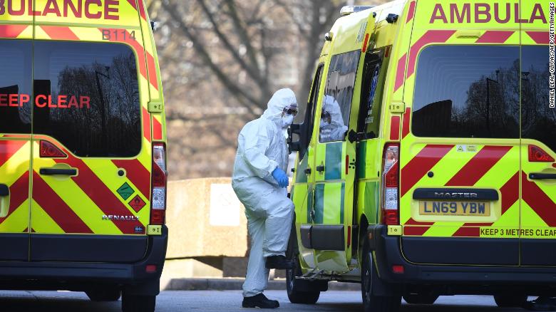 A member of the UK ambulance service wearing personal protective equipment at St Thomas' Hospital in London.