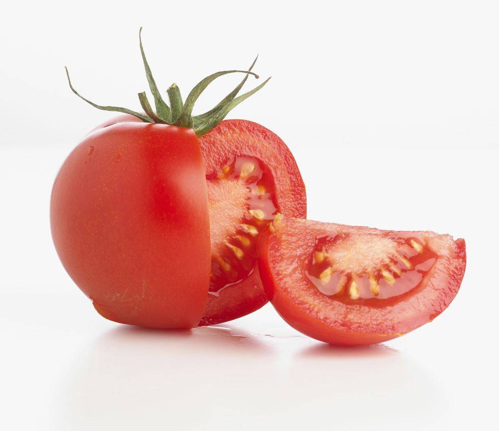 Tomato with a segment cut off