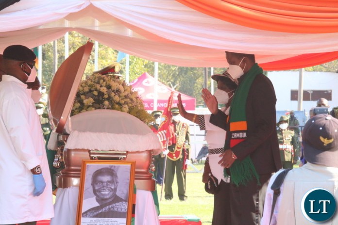 President Edgar Lungu and first lady Esther Lungu pay last respect to the late President Kaunda during the state funeral service at the show grounds