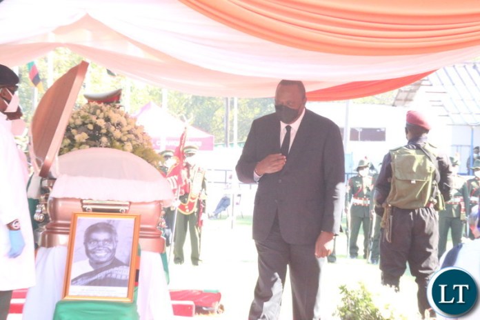 President of Kenya Uhuru Kenyatta pay his last respect to the late President Kaunda during the state funeral service at the show grounds