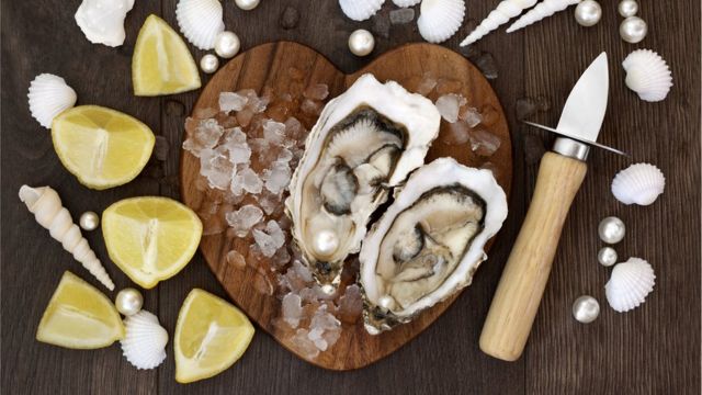 Oyster on a heart-shaped board