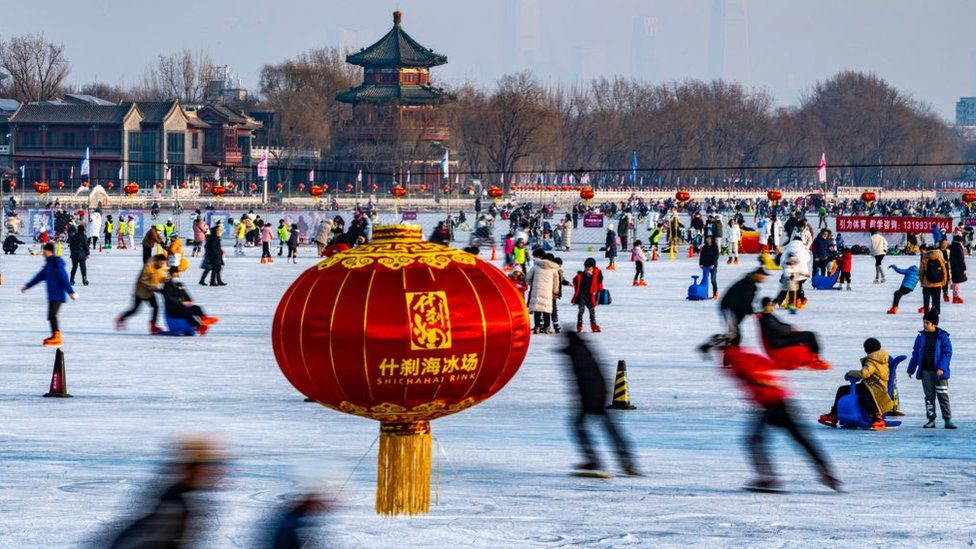 People enjoy skating at the Shichahai Ice Rink on January 5, 2023 in Beijing, China.