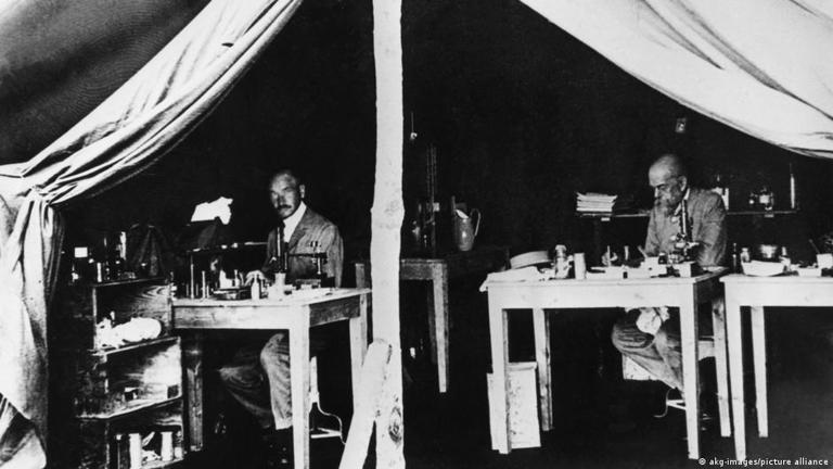 Rober Koch, right, had traveled previously to South Africa to study the Rinderpest plague, and also worked for other governments, in this case the British