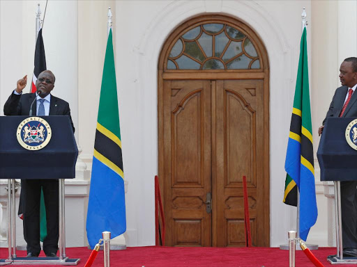 Presidents John Magufuli of Tanzania and Uhuru Kenyatta address a news conference during his official visit to Nairobi yesterday /REUTERS\THOMAS MUKOYA