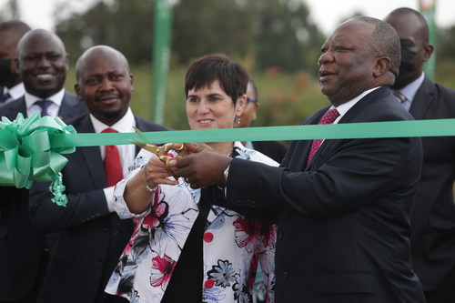 Ms Jenny Coetzee (Left), MD, Crawford International, and H.E. Mr Mninwa Johannes Mahlangu, High Commissioner of South Africa to the Republic of Kenya, cutting the ribbon during the Crawford Road naming ceremony