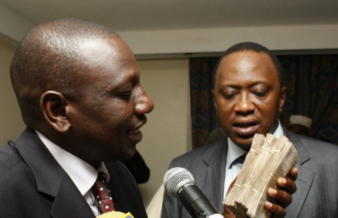 President Uhuru Kenyatta with Deputy President William Ruto captured with wads of cash.