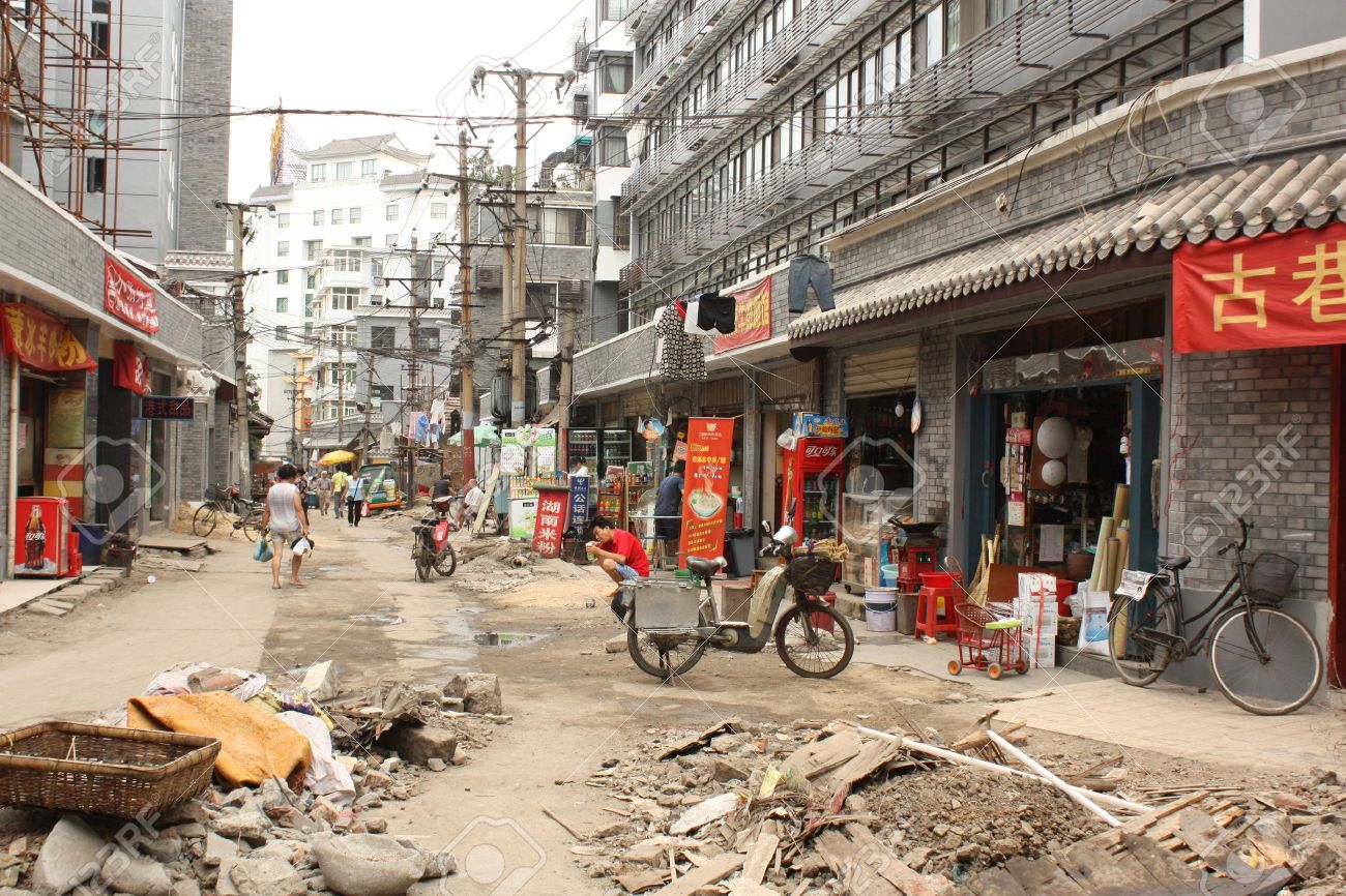 9350292-Poverty-in-streets-of-a-big-city-Wuhan-in-China-August-01st-2010-Stock-Photo.jpg