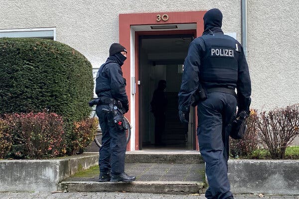 Security officers in Frankfurt on Wednesday after raids against 25 people suspected of belonging to a domestic terrorist group.