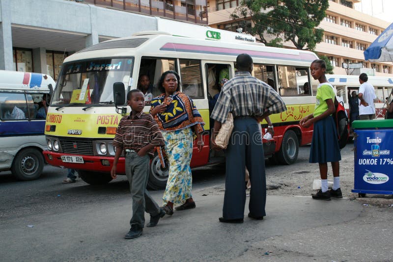 townspeople-waiting-public-transport-bus-stop-dar-es-salaam-tanzania-february-passengers-expect-transportation-to-50180893.jpg